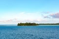 Privat island with beautiful beach in greenblue water ofa lagoon of Bora Bora. Perfect holiday destination, French Polynesi