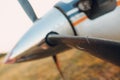 Small private single engine propeller airplane with fly on blade at regional airport Royalty Free Stock Photo