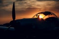 Small private single engine propeller airplane at sunset regional airport Royalty Free Stock Photo