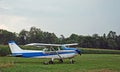 Small Plane on Rural Air Strip Royalty Free Stock Photo