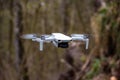 Small quadcopter DJI Mini 2, drone in flight Royalty Free Stock Photo