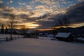 Small and quiet alpine village and winter sunrise snowy mountains around, Voronenko, Carpathian, Ukraine Royalty Free Stock Photo