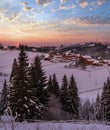 Small and quiet alpine village and winter sunrise snowy mountains around, Voronenko, Carpathian, Ukraine