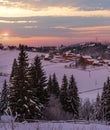 Small and quiet alpine village and winter sunrise snowy mountains around, Voronenko, Carpathian, Ukraine