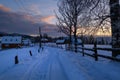 Small and quiet alpine village and winter sunrise snowy mountains around, Voronenko, Carpathian, Ukraine Royalty Free Stock Photo