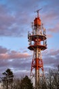Small radio tower at sunset on the Oschenberg, Bayreuth, Germany. Royalty Free Stock Photo