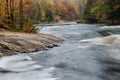 Small rapids and colorful autumn forest at Oxtongue river Royalty Free Stock Photo