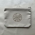 A small, rectangular fabric pouch with a zipper closure at the top Royalty Free Stock Photo
