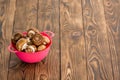 Small red bowl of fresh whole Baby Bella mushrooms Royalty Free Stock Photo