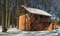 A small red brick building on a sunny winter day, Pelci, Latvia Royalty Free Stock Photo