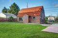 Small red brick home on a sunny day Royalty Free Stock Photo