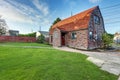 Small red brick home on a sunny day Royalty Free Stock Photo