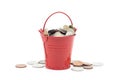 Small red bucket full of money on white background Royalty Free Stock Photo