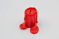 Red candle stub closeup on white Royalty Free Stock Photo