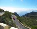 Small red car on the road to Masca Royalty Free Stock Photo