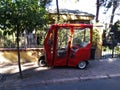 Red electric bike parked on the street