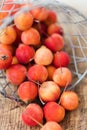 Small red crab apples in basket Royalty Free Stock Photo