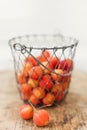 Small red crab apples in basket Royalty Free Stock Photo