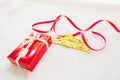 Red gift box and gold merry christmas text with red ribbon Royalty Free Stock Photo