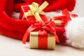 Small red and golden boxes with gifts tied bows Royalty Free Stock Photo