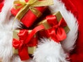 Small red and golden boxes with gifts tied bows Royalty Free Stock Photo