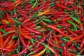 Small red and green chili peppers Royalty Free Stock Photo