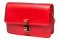 Small red leather women`s bag or purse, on a white background Royalty Free Stock Photo