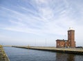 Small red lighthouse. Royalty Free Stock Photo