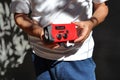 Small red portable radio rechargeable with solar panels Royalty Free Stock Photo