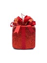 A small red present Christmas ornament for hanging on a Christmas tree Royalty Free Stock Photo