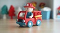 A small red toy fire truck with a firefighter inside Royalty Free Stock Photo