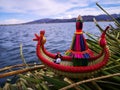 Small reed raft in floating islands of the Uros