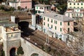 Small regional train station, located between mountains, at Riomaggiore town in Cinque Terre national park, Italy Royalty Free Stock Photo