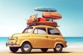 a small retro car packed with luggage and beach equipment on the roof, perfect for a summer road trip. The blue background and Royalty Free Stock Photo