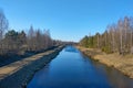 A small river along the forest in autumn or early spring Royalty Free Stock Photo