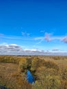 Small river in autumn yellow trees Royalty Free Stock Photo