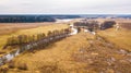 Small river with dry trees without leaves in winter / early spring aerial view Royalty Free Stock Photo