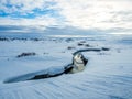 Small River in the middle of snow during winter