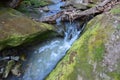 Small river with waterfall