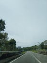 a small road bends to ranau