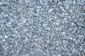 Small road stone background, dark gravel pebbles stone texture