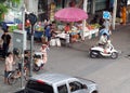 Small road to main street junction corner everyday life scene in BANGKOK, THAILAND Royalty Free Stock Photo