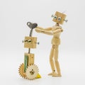 Small robot made with wood and screws Royalty Free Stock Photo