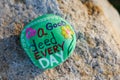 Message painted on a small rock