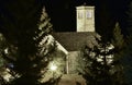 small romanesque church with its typical tower made in all stones in the middle of a forest illuminated by night Royalty Free Stock Photo