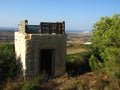 A small room in the Maltese countryside, used by farmers, with a wooden hide on top. Royalty Free Stock Photo