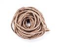 Small rope coiled on white background