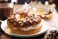 Small `roscon de reyes` filled with whipped cream for Epiphany day in Spain