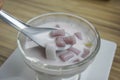 Small round balls made from taro mixed with tapioca flour with sweet coconut milk, Thai dessert called Bualoy