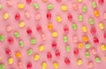 Small round candy-colored pastels on pastel background